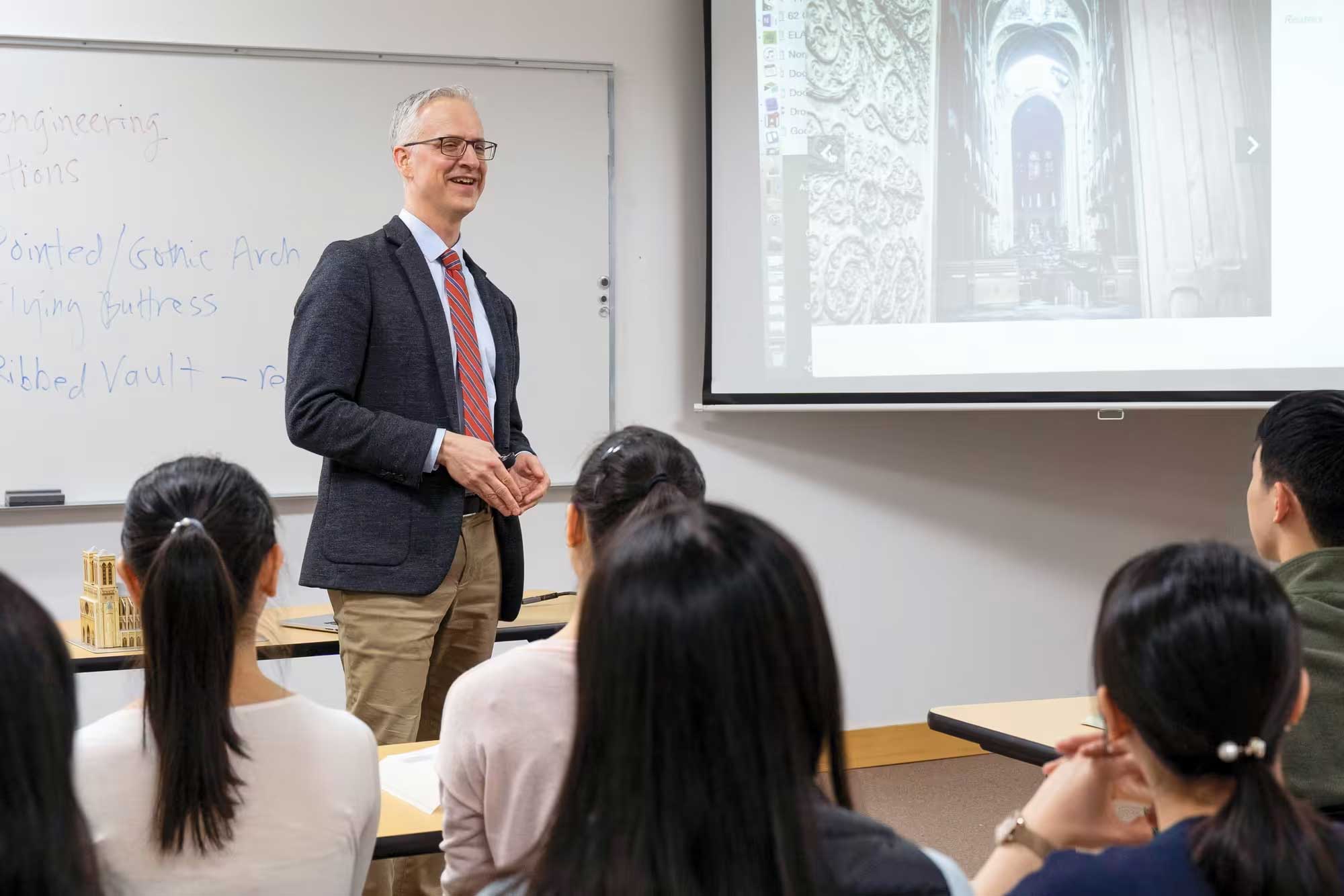 Teacher teaching at campus